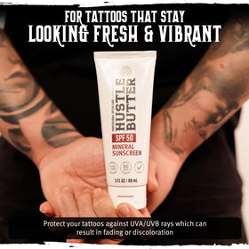 Hustle Butter in beach setting protecting tattoos during sun exposure