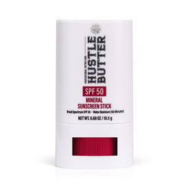 Hustle Butter Deluxe front packaging showing compact SPF 50 stick and benefits