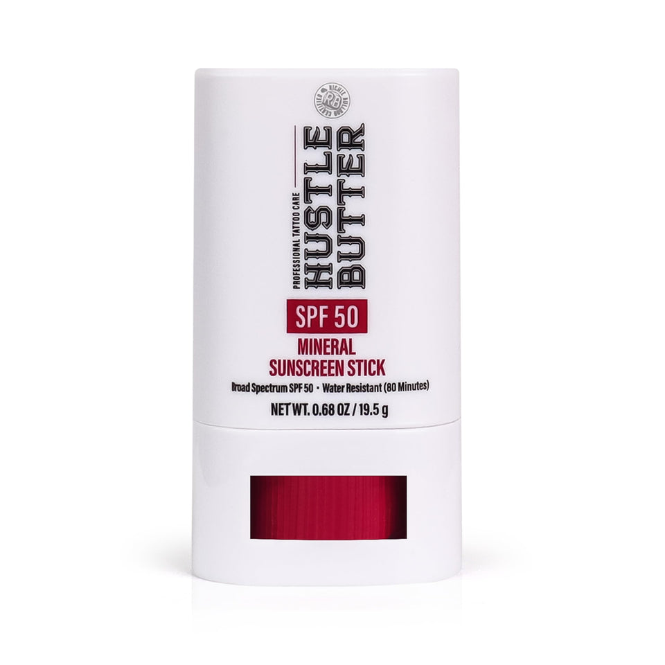 Hustle Butter Deluxe front packaging showing compact SPF 50 stick and benefits