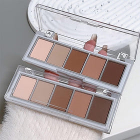 Hxssll palette next to hand illustrating compact size and easy storage benefit