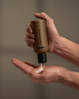 HygieneLab face wash lather in hand illustrating mild cleansing without dryness