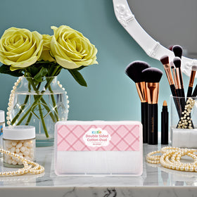 ICOTLE pads placed on a vanity beside skincare bottles showing everyday routine benefit