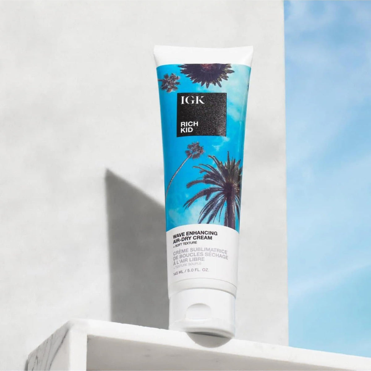 IGK Rich Kid with coconut to indicate moisturizing ingredient benefits