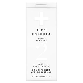 ILES FORMULA front bottle showing clean salon-grade packaging and instant clarity