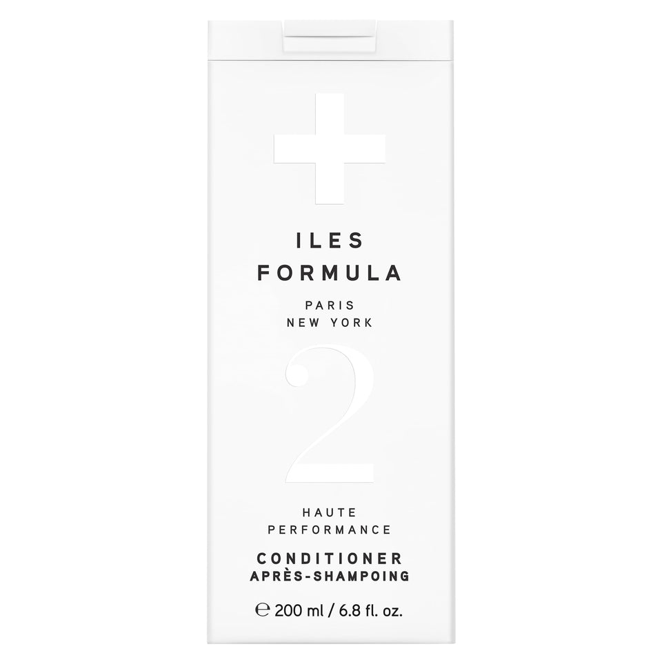 ILES FORMULA front bottle showing clean salon-grade packaging and instant clarity