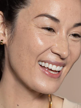 ILIA blended skin finish close shot showing dewy-satin look and pore-softening benefit