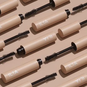 ILIA wand applying mascara to lower lashes for precise definition and no clumps