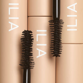 ILIA mascara on vanity styled with clean-beauty items suggesting everyday use