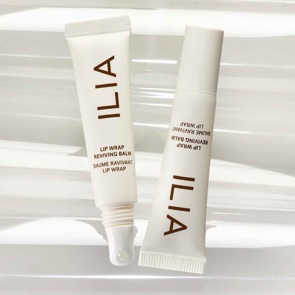 ILIA texture on fingertip showing smooth hydrating formula benefit