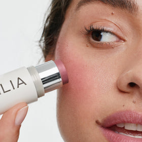 ILIA mauve rose swatch on arm illustrating buildable pigmentation and wearable shade