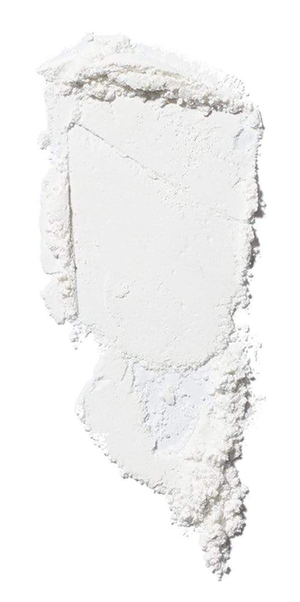 ILIA open powder pan showing translucent loose powder for blur effect and light finish
