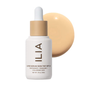 ILIA front bottle showing product branding and compact design benefit
