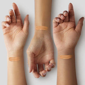 ILIA Ora ST6 swatch on arm showing warm light shade match benefit