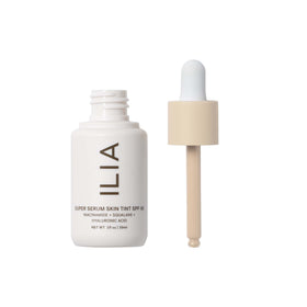 ILIA skin tint texture close-up showing dewy serum-like finish and hydrating feel