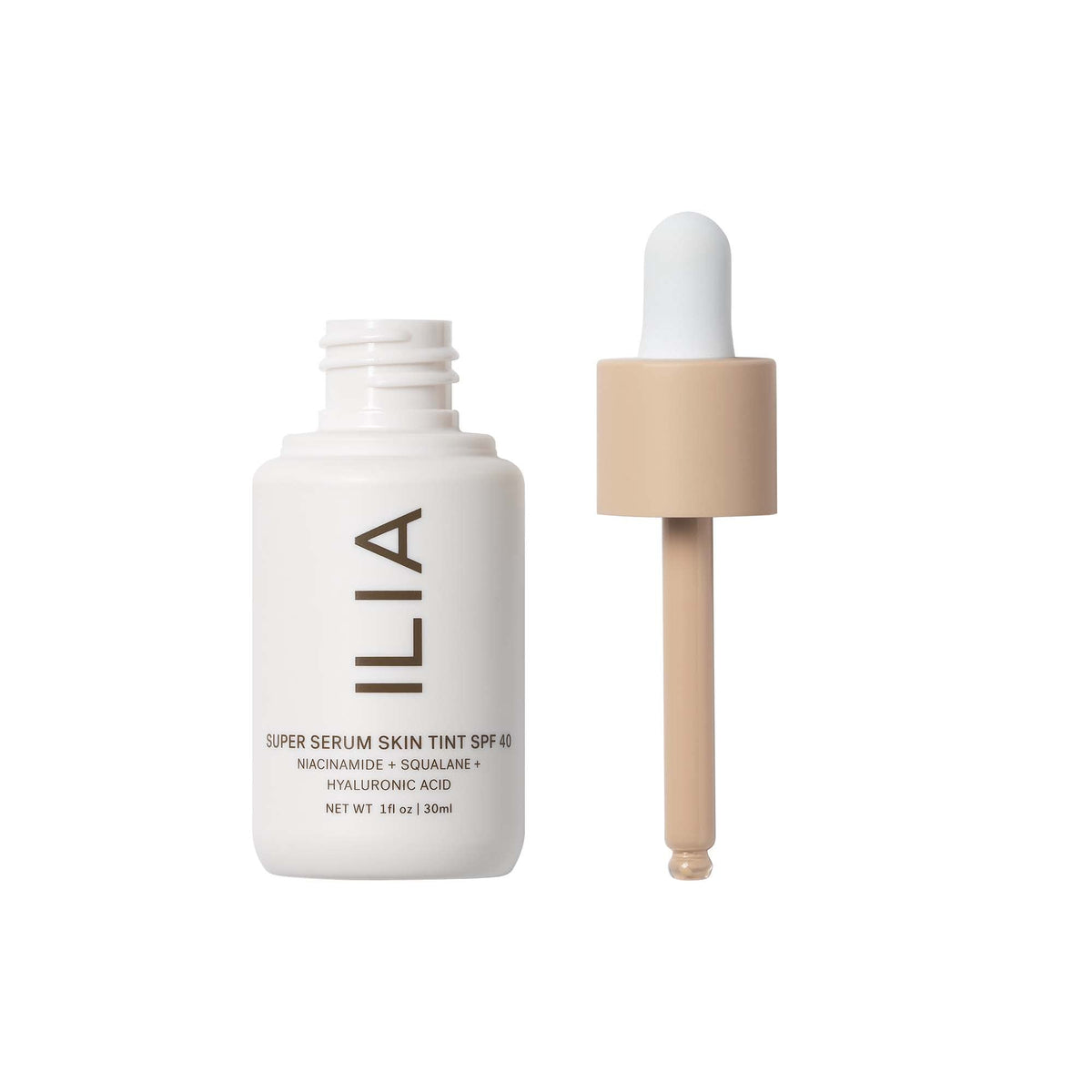 ILIA texture close-up of dewy drops, highlighting smooth hydrating finish