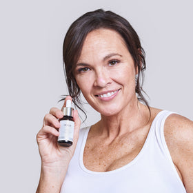 IMAGE Skincare serum spread on skin showing smoother hydrated surface