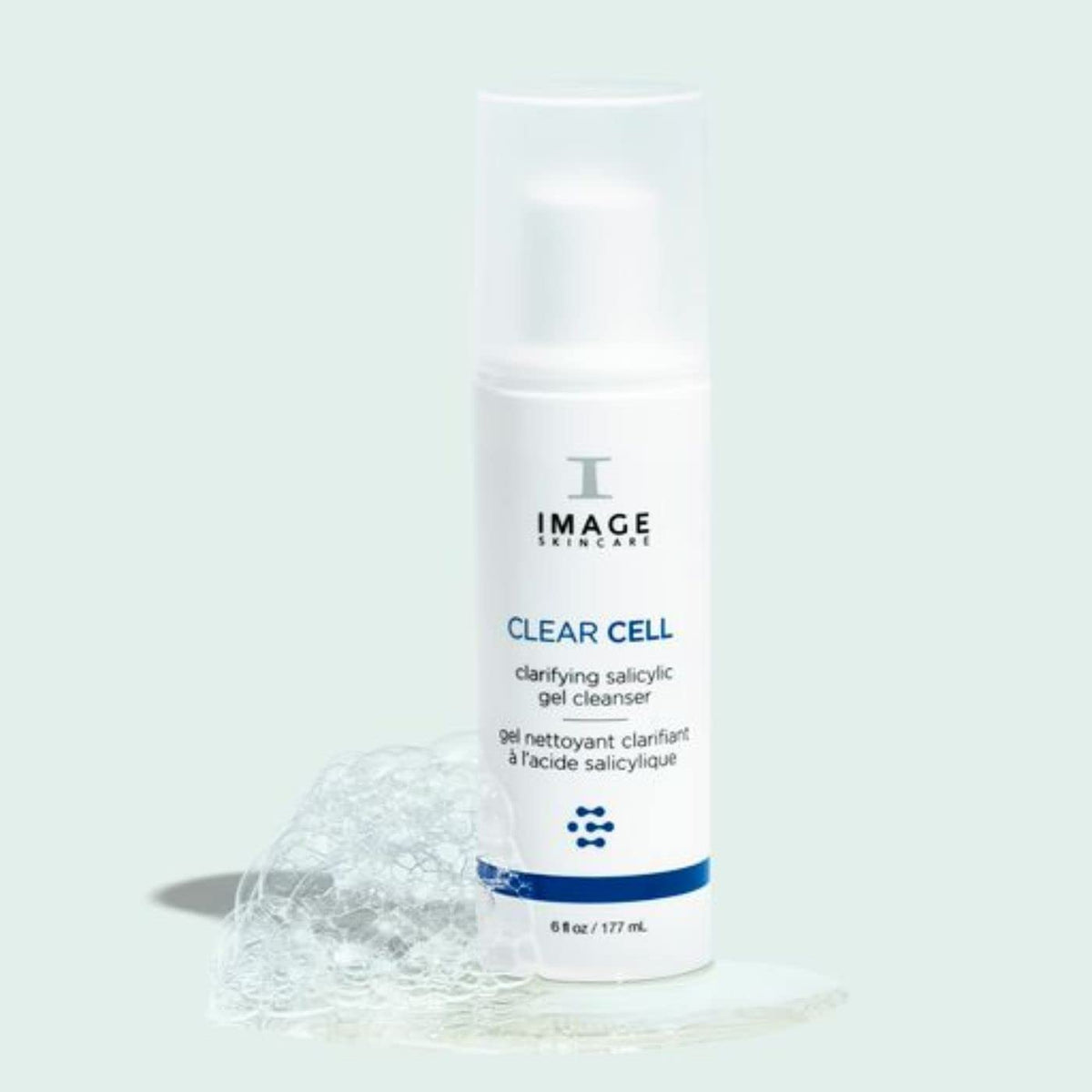 IMAGE Skincare bottle in hand to show 6 fl oz size and travel-friendly scale