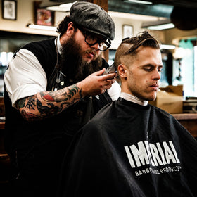 Imperial Barber Grade classic pomade next to a 6 oz scale, clear size and value