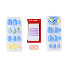 imPRESS manicure stick, mini file, and prep pad arranged to show included application tools