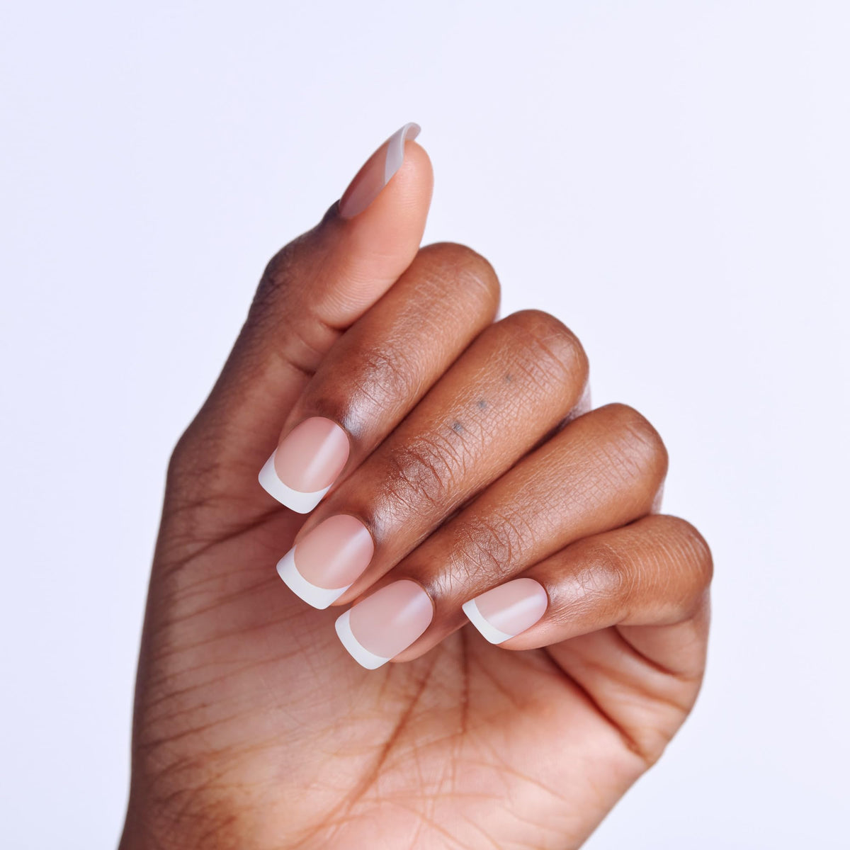 imPRESS close-up of white French tip detail highlighting neat gel-like finish