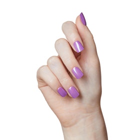 imPRESS Kiss nails applied on hands showing finished manicure with durable adhesive benefit