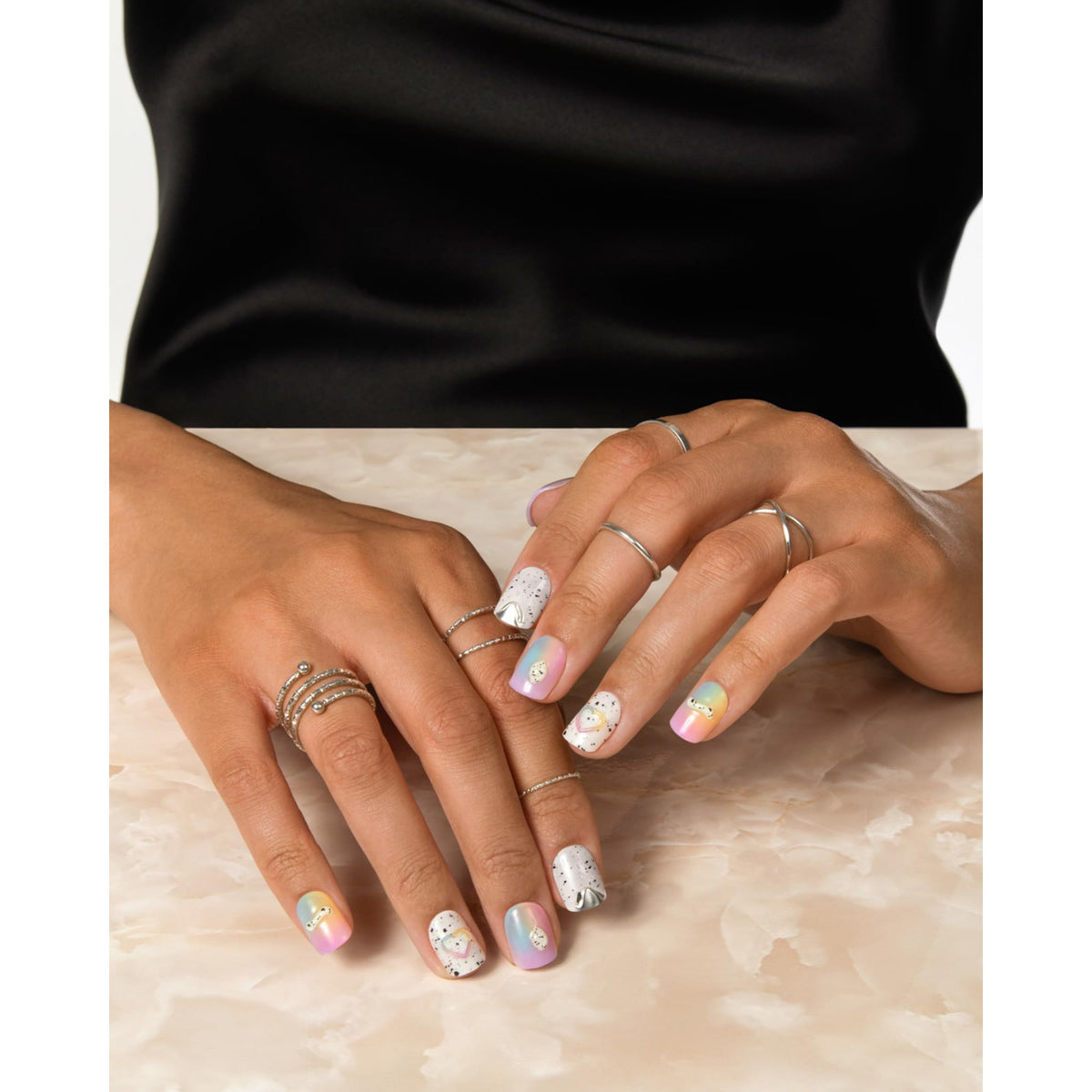 imPRESS nails worn on hand in lifestyle scene for instant polished look