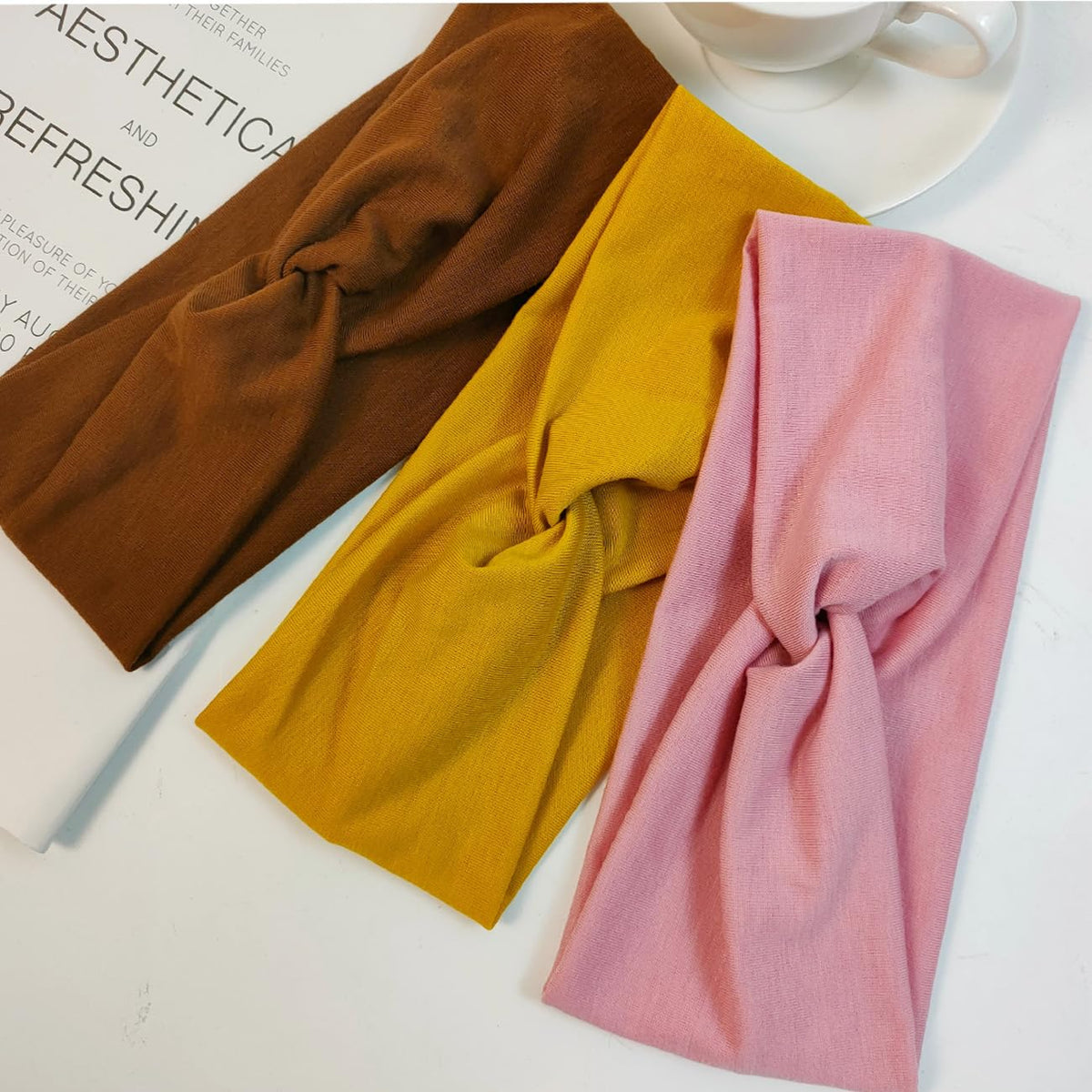 IMYORT headbands styled on tray with outfit illustrating easy outfit matching