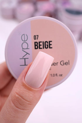 IN.HYPE gel being sculpted on a nail form showing controlled application benefit
