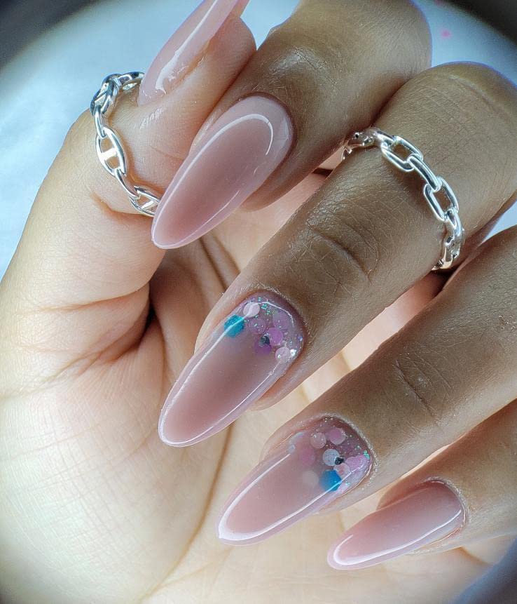 IN.HYPE finished nail detail after filing showing neat, durable result