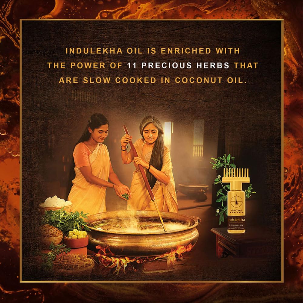 Indulekha Bringha being massaged into scalp demonstrating application benefit