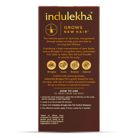 Indulekha Bringha selfie bottle in hand illustrating portable convenience