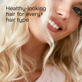 INFINITIPRO BY CONAIR finished beach waves on model showcasing natural, textured result benefit