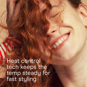 INFINITIPRO BY CONAIR curling iron used on medium-length hair creating loose curls benefit