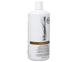 INFUSIUM 23 applying treatment to hair in hands for easy spread and penetration