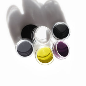 Inglot AMC gel eyeliner 77 next to coin for size scale and travel-friendly portability