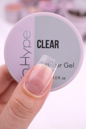 IN.HYPE gel being sculpted on a nail form demonstrating clean extension