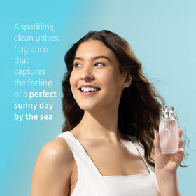 Inis spray in use on skin demonstrating fresh aquatic scent application