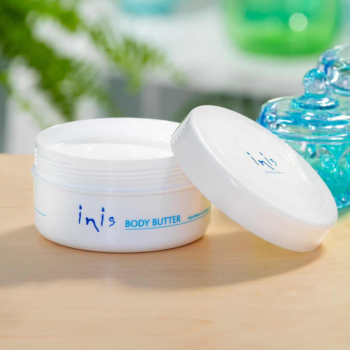 Close-up whipped texture of Inis body butter illustrating creamy spreadability