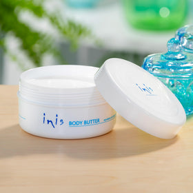 Close-up whipped texture of Inis body butter illustrating creamy spreadability
