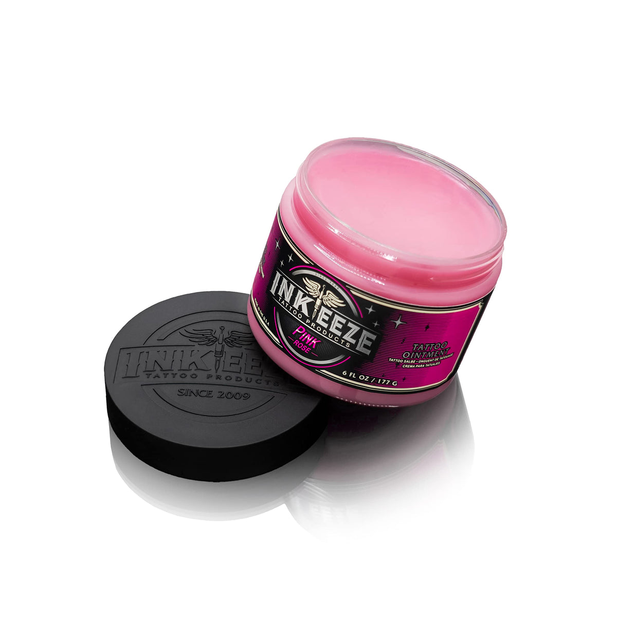 INK-EEZE pink ointment texture close-up showing smooth spreadability and gliding benefit