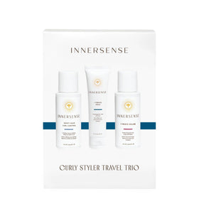 INNERSENSE applying product to damp curls before diffusing to enhance styling control