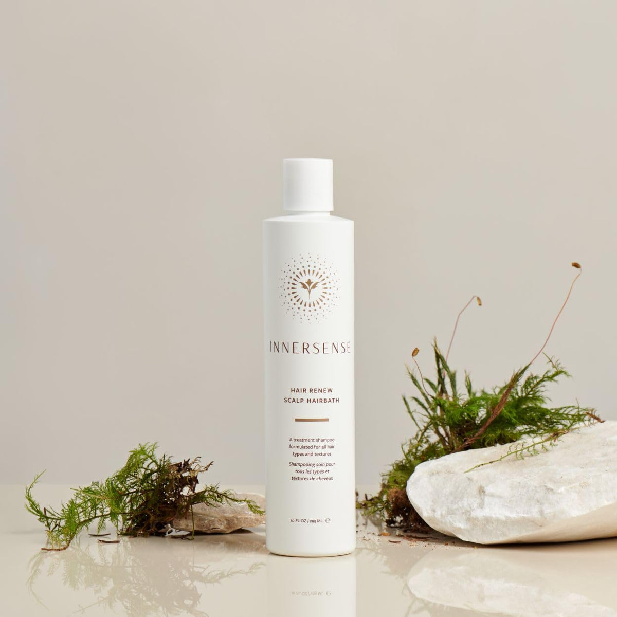 INNERSENSE bottle in shower setup illustrating scalp-care routine benefit