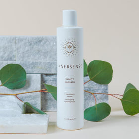 INNERSENSE in-hand application on wet hair showing easy rinse and scalp comfort