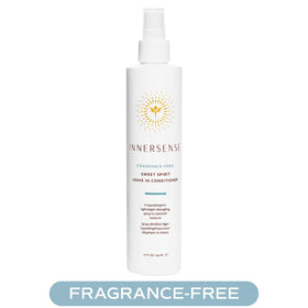 Innersense bottle spraying mist demonstrating easy detangling action