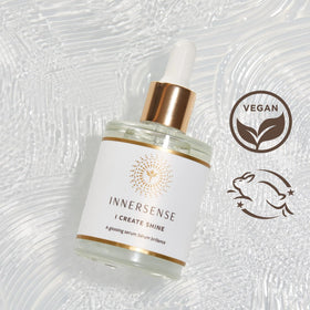 INNERSENSE droplet texture on fingertip showing lightweight absorbent oil