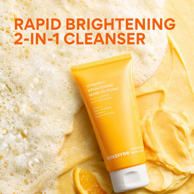 innisfree tube beside green tea and tangerine illustrating key ingredients