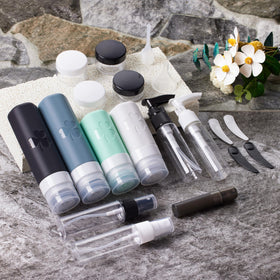 INSFIT bottles held in hand for scale, illustrating compact travel size and lightweight portability