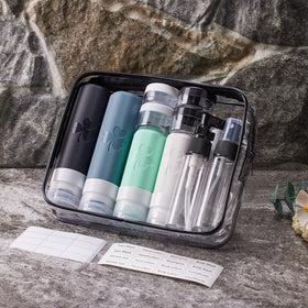 INSFIT clear toiletry bag neatly organized inside carry-on luggage for airport-ready packing and saving space