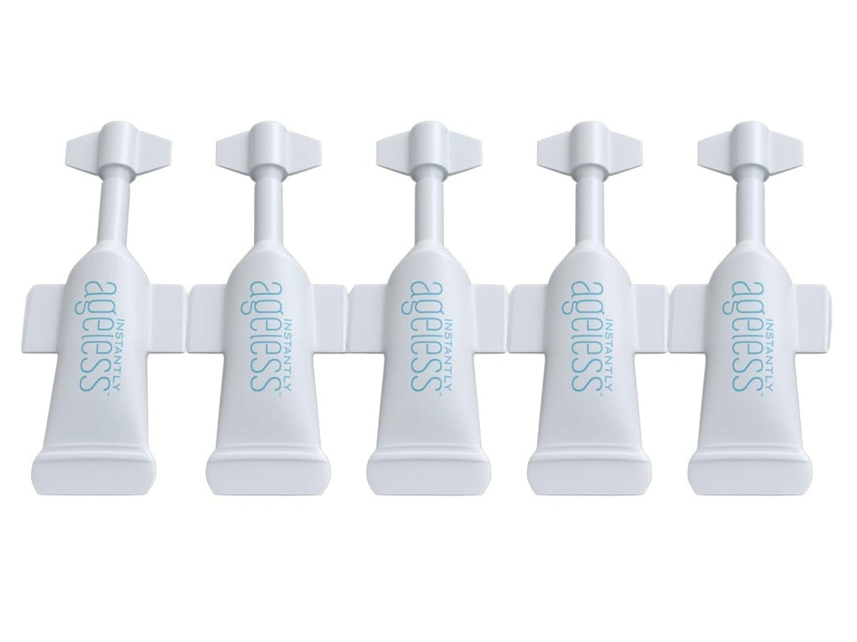 Instantly Ageless front packaging showing five compact vials and benefits
