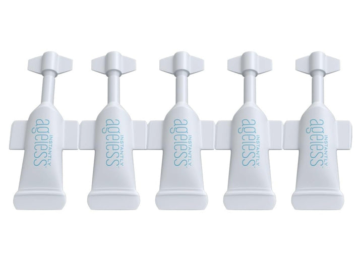 Instantly Ageless front packaging showing five compact vials and benefits